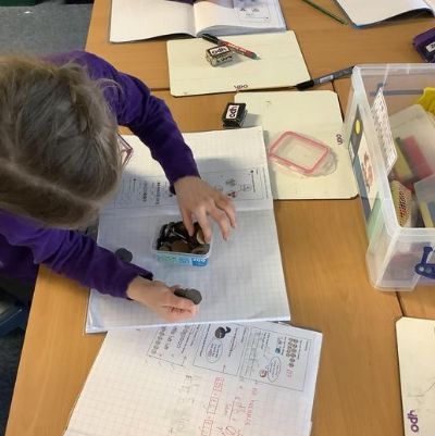 We have been learning to add up money including both notes and coins.