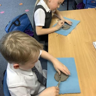 We have been experimenting with clay learning how to mold, carve and use techniques to join before we make our dragon eyes with the clay.